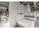 Bedroom with closet and ensuite bathroom, exposed ceilings and fan at 120 Ralph Mcgill Ne Blvd # 1502, Atlanta, GA 30308