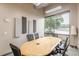 Modern conference room with large window and ample seating at 120 Ralph Mcgill Ne Blvd # 1502, Atlanta, GA 30308
