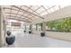 Covered entrance features planters and access to the building at 120 Ralph Mcgill Ne Blvd # 1502, Atlanta, GA 30308
