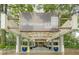 Welcoming entrance to Renaissance Lofts, showcasing modern architecture and lush landscaping at 120 Ralph Mcgill Ne Blvd # 1502, Atlanta, GA 30308