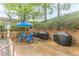 Outdoor grilling area with a table and chairs for a relaxed cooking and dining experience at 120 Ralph Mcgill Ne Blvd # 1502, Atlanta, GA 30308
