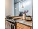 Kitchen with granite countertops, stainless steel appliances and light wood cabinets at 120 Ralph Mcgill Ne Blvd # 1502, Atlanta, GA 30308