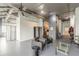 Spacious living room showcasing exposed pipes, gray walls, and an open kitchen area at 120 Ralph Mcgill Ne Blvd # 1502, Atlanta, GA 30308