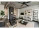 Bright living room featuring modern decor, neutral tones, track lighting, and a stylish ceiling fan at 120 Ralph Mcgill Ne Blvd # 1502, Atlanta, GA 30308