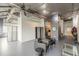 Spacious living room with modern, minimalist design and industrial-style ceiling fixtures at 120 Ralph Mcgill Ne Blvd # 1502, Atlanta, GA 30308