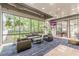 Bright lobby area with floor-to-ceiling windows and comfortable seating, offering a welcoming and airy space for guests and residents at 120 Ralph Mcgill Ne Blvd # 1502, Atlanta, GA 30308