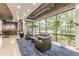 Well-lit lobby with reception desk, leather furniture, oversized plants, and large windows at 120 Ralph Mcgill Ne Blvd # 1502, Atlanta, GA 30308
