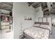 Bedroom with a walk-in closet, with modern finishes, exposed pipes, and ample natural light at 120 Ralph Mcgill Ne Blvd # 1502, Atlanta, GA 30308