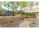 Outdoor patio with seating area and lush greenery, perfect for relaxing and enjoying the outdoors at 120 Ralph Mcgill Ne Blvd # 1502, Atlanta, GA 30308