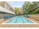 A clean, sparkling outdoor swimming pool surrounded by lounge chairs, perfect for relaxation and recreation at 120 Ralph Mcgill Ne Blvd # 1502, Atlanta, GA 30308