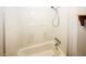 Clean bathroom featuring a tub and shower combo with white tile at 1200 Ashborough Se Ter # A, Marietta, GA 30067