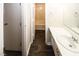 Bathroom with a vanity, a mirror, and a view of the bathtub and shower at 1200 Ashborough Se Ter # A, Marietta, GA 30067