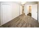 Bedroom featuring carpeted floors, a ceiling fan, a closet, and access to the bathroom at 1200 Ashborough Se Ter # A, Marietta, GA 30067