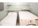 Laundry room with white washer and dryer at 1200 Ashborough Se Ter # A, Marietta, GA 30067