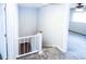 Carpeted staircase leading to an upper level with white railings at 1200 Ashborough Se Ter # A, Marietta, GA 30067