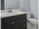 Bathroom features a modern vanity with sleek hardware, a light countertop, and contemporary finishes at 243 Howell Ter, Atlanta, GA 30331