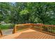 Enjoy scenic views from the wooden deck of this charming property at 243 Howell Ter, Atlanta, GA 30331