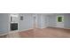 A living room with a bathroom on the left and a door leading outside on the right at 243 Howell Ter, Atlanta, GA 30331