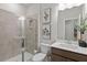 Modern bathroom with a tiled shower and vanity with sleek fixtures at 3443 Hillyard Dr, Dacula, GA 30019