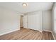 Comfortable bedroom with a double closet, modern flooring, and ample natural light at 4005 Greentree Ct, Douglasville, GA 30135
