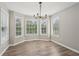 Bright dining room featuring large windows and hardwood floors at 4005 Greentree Ct, Douglasville, GA 30135