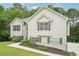 Well-maintained home with a blend of traditional design and manicured landscaping at 4005 Greentree Ct, Douglasville, GA 30135