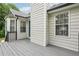Charming home exterior showcasing the deck and teal front door, creating a welcoming entrance at 4005 Greentree Ct, Douglasville, GA 30135