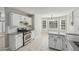 Well-lit kitchen featuring stainless steel appliances and granite counters at 4005 Greentree Ct, Douglasville, GA 30135