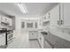 Well-lit kitchen with stainless appliances and granite counters at 4005 Greentree Ct, Douglasville, GA 30135