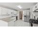 Well-lit kitchen featuring stainless steel appliances and granite counters at 4005 Greentree Ct, Douglasville, GA 30135