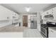 Well-lit kitchen featuring stainless steel appliances and granite counters at 4005 Greentree Ct, Douglasville, GA 30135