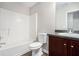 Bathroom includes shower and tub, toilet, and vanity with granite countertop at 222 Ben Ln, Fairburn, GA 30213