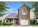 Charming brick-front home with a one-car garage and manicured landscaping at 222 Ben Ln, Fairburn, GA 30213