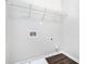 Laundry room with white walls, hardwood flooring, and utility hookups at 222 Ben Ln, Fairburn, GA 30213