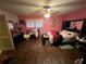 Bedroom with hardwood floors and pink walls at 2323 Valleyside Dr, Decatur, GA 30032