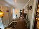 Inviting entryway with decorative lighting, brick wall, and wood-look floors at 2323 Valleyside Dr, Decatur, GA 30032