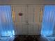 Front doors with lacey curtains at 2323 Valleyside Dr, Decatur, GA 30032