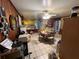 Kitchen and dining area featuring wood walls and tile flooring at 2323 Valleyside Dr, Decatur, GA 30032