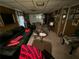 Cozy living room with comfortable seating and a coffee table, decorated with personal items at 2323 Valleyside Dr, Decatur, GA 30032
