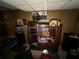 Entertainment area featuring wood furniture, CD's and a stereo system with art on the walls at 2323 Valleyside Dr, Decatur, GA 30032