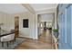 Inviting foyer features beautiful hardwood floors, neutral decor and a view into the home's open-concept living spaces at 288 Rockledge Sw Bnd, Powder Springs, GA 30127