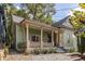 Charming home with a covered front porch and beautiful landscaping, offering a warm and inviting curb appeal at 360 Kelly Se St, Atlanta, GA 30312
