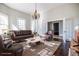 Bright living room featuring hardwood floors, a cozy seating area, and natural light from the windows at 360 Kelly Se St, Atlanta, GA 30312