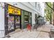 Charming bicycle shop storefront with colorful decor, sidewalk seating, and a vibrant urban vibe at 360 Kelly Se St, Atlanta, GA 30312