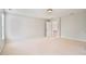 Bedroom featuring carpet, an open closet, and natural light at 5513 Lavender Farms Rd, Powder Springs, GA 30127