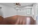 Bonus room boasts hardwood floors, recessed lighting, a fan and lots of space for flexible usage at 5513 Lavender Farms Rd, Powder Springs, GA 30127