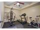 Home gym featuring a variety of exercise equipment on a black rubber floor at 5513 Lavender Farms Rd, Powder Springs, GA 30127