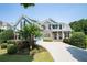 Charming two-story home featuring stone accents, manicured landscaping, and a welcoming front entrance at 5513 Lavender Farms Rd, Powder Springs, GA 30127