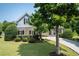 Charming home with stone accents, lush landscaping, and a welcoming front yard for curb appeal at 5513 Lavender Farms Rd, Powder Springs, GA 30127