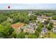 An aerial view depicts the home's location near Smyrna Market Village and surrounding mature trees at 1184 Medlin Se St, Smyrna, GA 30080